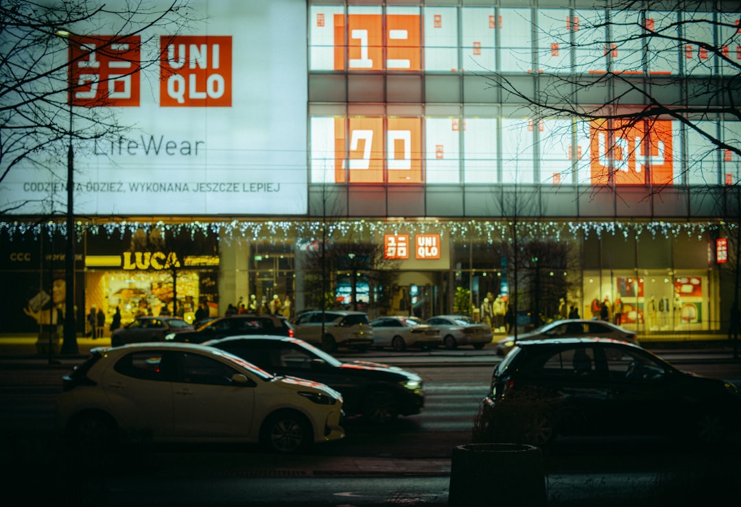 Uniqlo store facade with cars on street