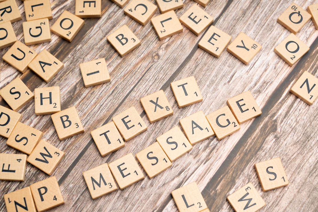 scrabble tiles spelling out words on a wooden surface