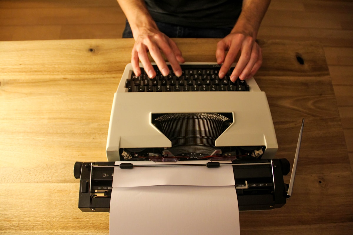 Vintage typewriter on desk representing students abandoning keyboards to avoid AI detection