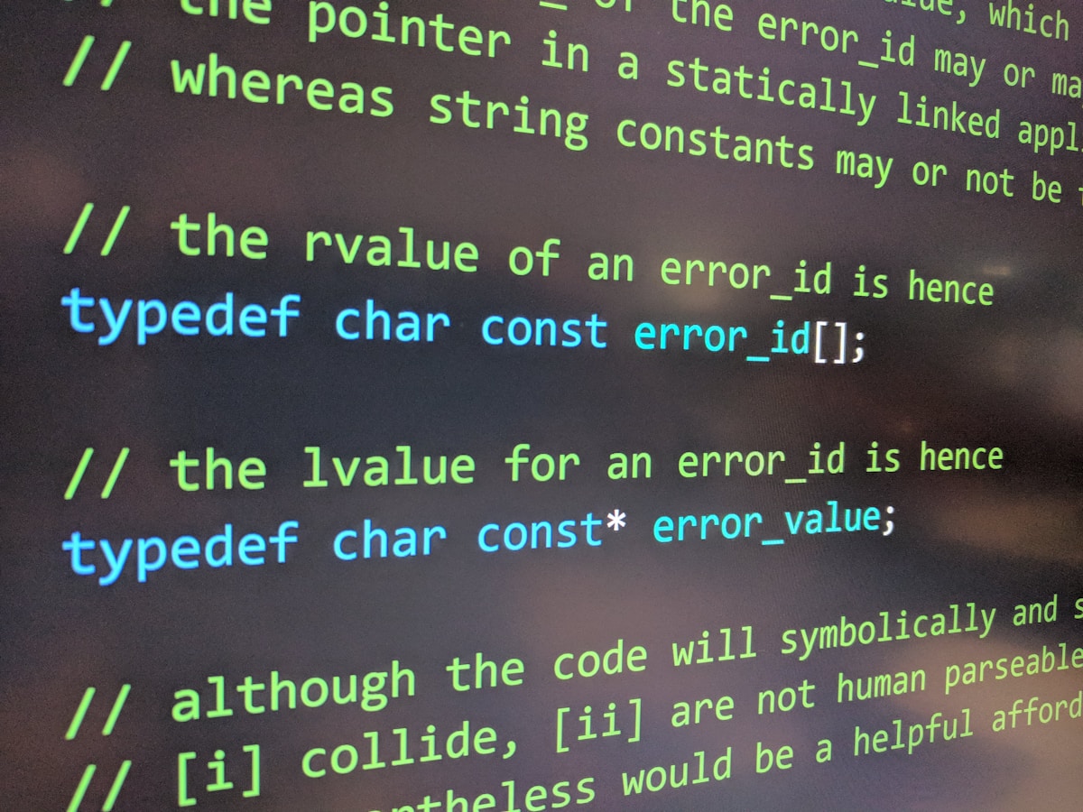 Software code on computer screen representing AI safety technical debt accumulation