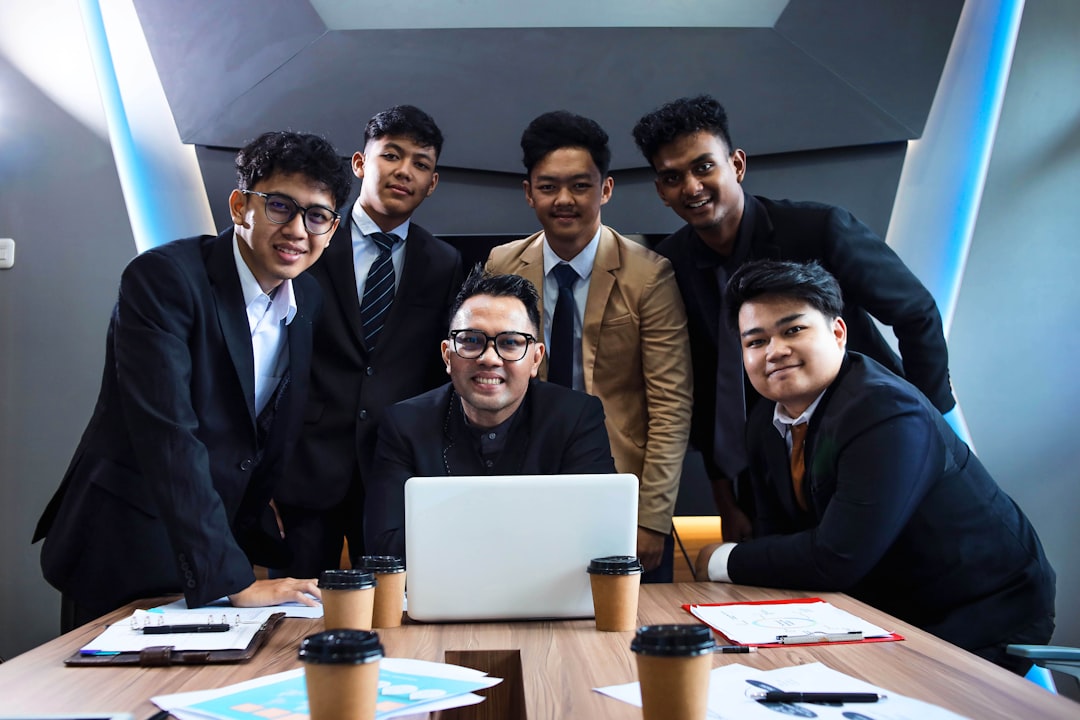 Group of young businessman (Part Of Series) For complete series images visit my adobe account https://stock.adobe.com/uk/cont